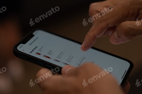 Preview: person looking up MacDonalds app menu to order some take away food