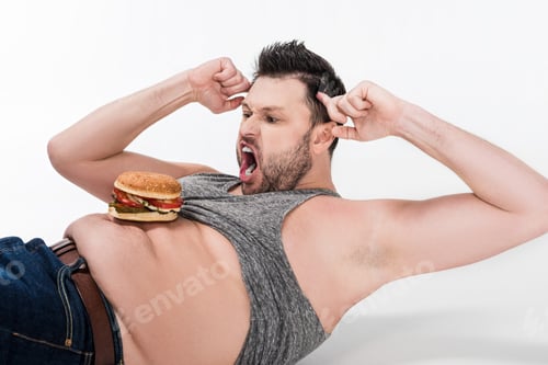 Preview: yelling overweight man with burger on belly lying and doing abs exercise on white