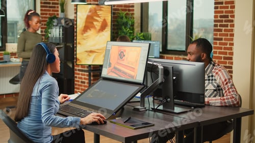 Preview: Asian graphic designer working on interface development