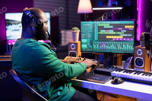 Preview: Man Creating Electronic Music in a Studio