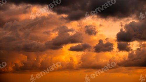 Preview: Beautiful evening sky with pink clouds. Sunset over the sea