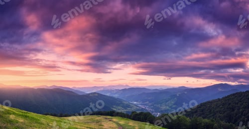 Preview: Mountains at beautiful sunset in summer. Colorful landscape