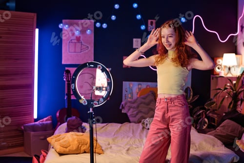 Preview: Teen Girl Recording Video On Smartphone