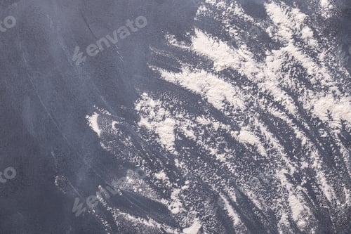 Preview: Baking or cooking background, flour on the dark background