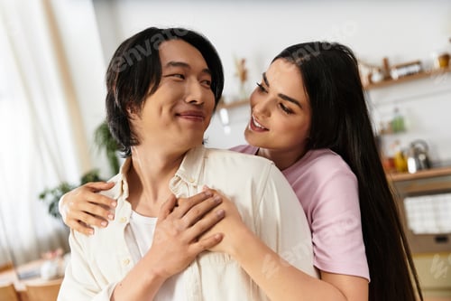 Preview: Loving couple shares a tender moment together in their cozy home on a sunny afternoon
