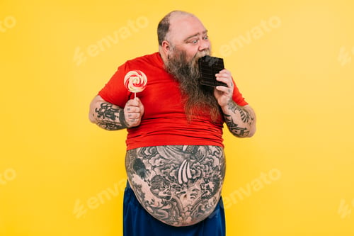 Preview: Man eating a chocolate tablet.