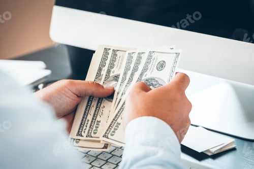 Preview: Caucasian hands counting dollar banknotes