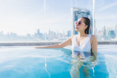 Preview: Portrait beautiful young asian woman relax leisure around swimming pool