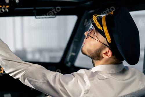 Preview: Airplane cabin The pilot checks the electronics by pressing the buttons Preparing passenger liner