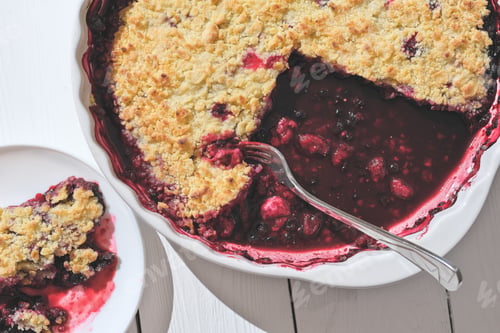 Preview: Delicious juicy dessert, blueberry pie slices topped with a sweet crunchy streusel.