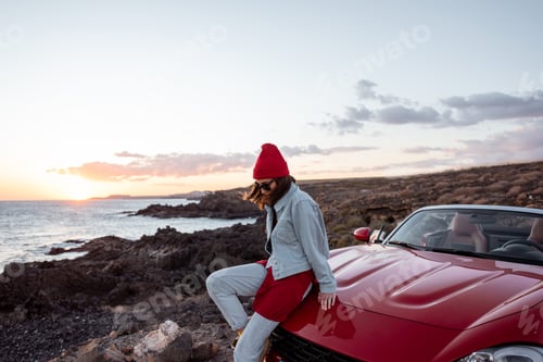 Preview: Lovely couple on the beach, traveling by car