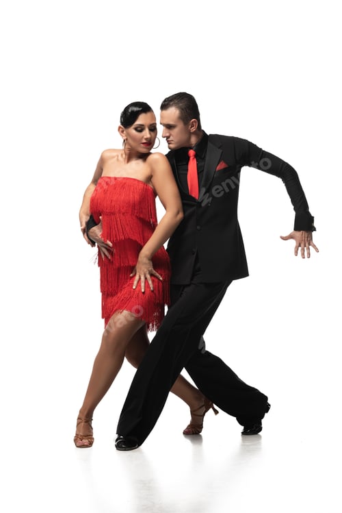 Preview: elegant, graceful couple of dancers performing tango on white background