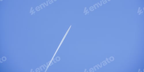 Preview: Beautiful view of an airplane flying across clear sky