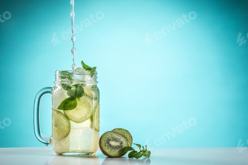 Preview: The rose exotic cocktail and fruit on blue