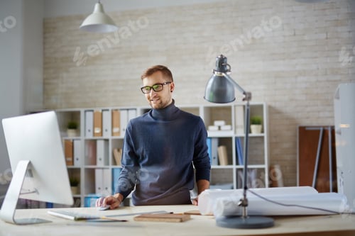 Preview: Office worker by computer