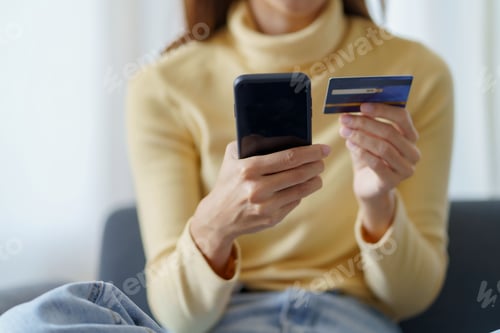 Preview: Woman Shops Online With a Mobile Phone