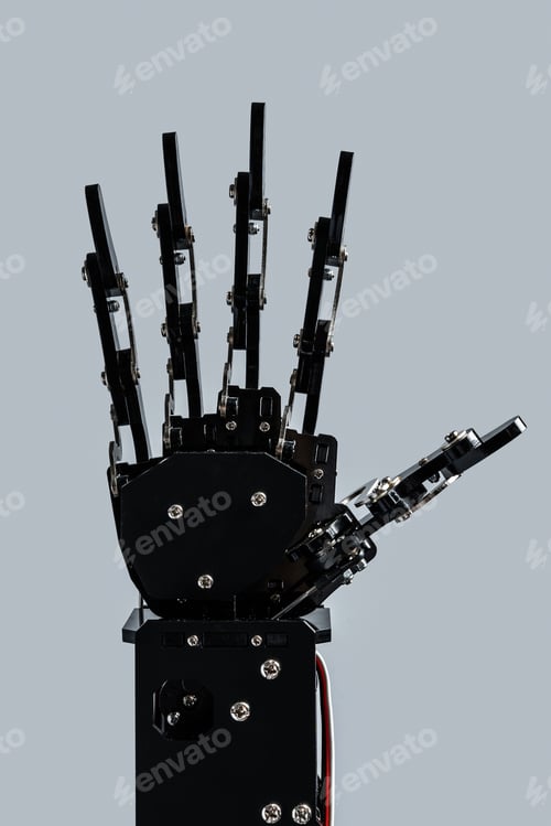 Preview: Real robot's hand isolated on grey background.