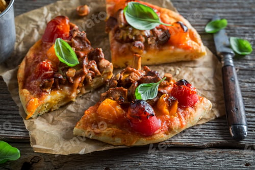 Preview: Delicious pizza on old wooden rustic table