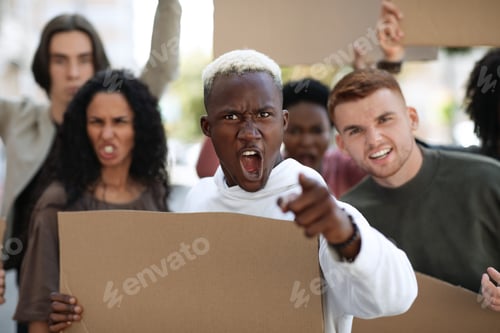 Preview: Mutiracial group of demonstrators striking on the street