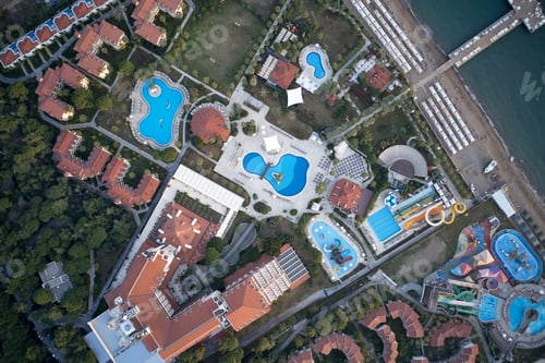 Preview: Aerial view of luxury resort hotel with swimming pools.