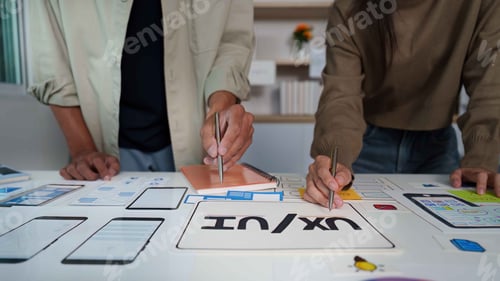Preview: Creative Team Working on UX UI Designs in Bright Office