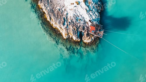 Preview: Beautiful high angle view of rocky cliffs on water on the Beach of Architiello of San Felice, Italy