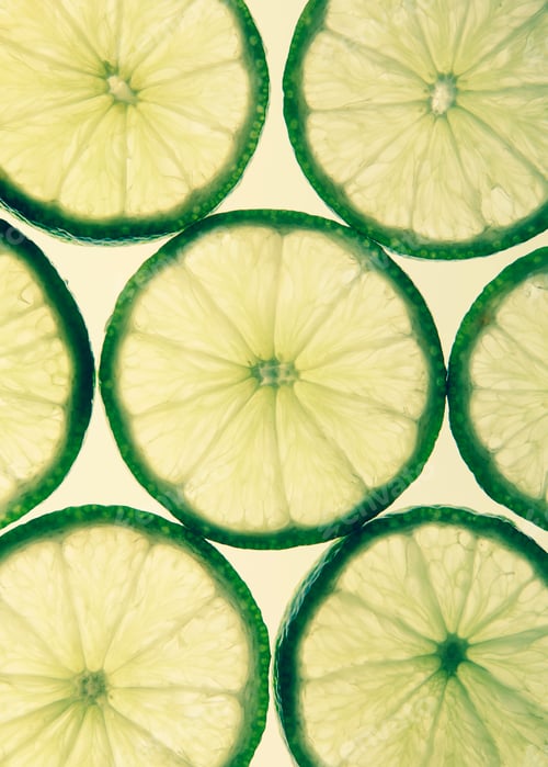 Preview: Organic lime slices on white background