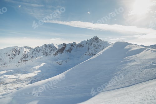 Scenic Winter Mountains with Snow and Blue Skies