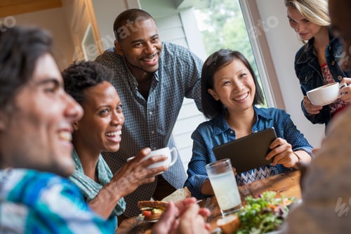 Preview: A group of people meeting in a cafe. Using digital tablets and smart phones.