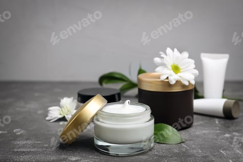 Preview: Composition with body cream in jars on grey background