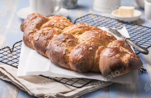 Preview: Tsoureki braid, greek easter sweet bread, on wood