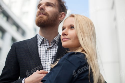 Preview: Man and woman looking into the distance