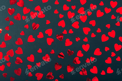 Preview: Red paper hearts scattered on black background. Valentines day concept. Top view, flat lay