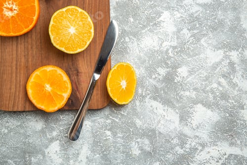 Preview: top view fresh sliced oranges mellow citruses on the white background ripe fruit exotic fresh