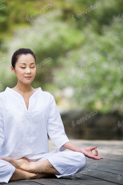 Preview: Young Chinese woman in meditation