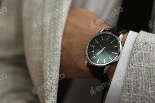 Preview: Wristwatch on Arm with Textured Jacket Sleeve