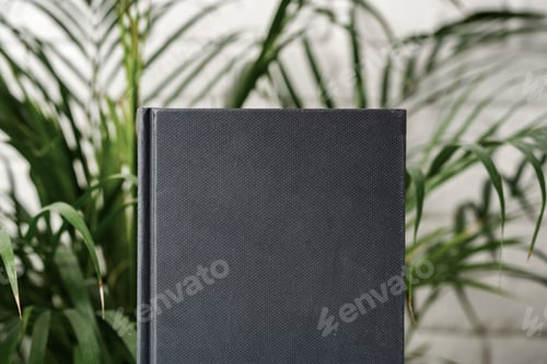 Preview: Tropical palm leaves and blank notepad mock up