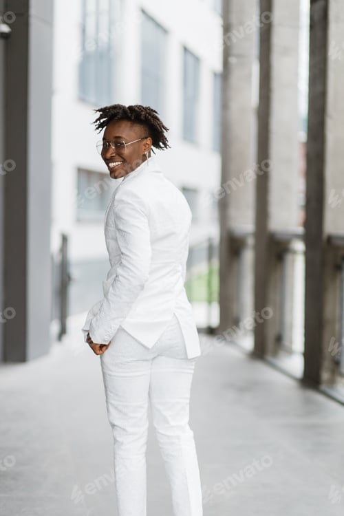 Preview: Close up shot of beautiful stylish African woman in modern city