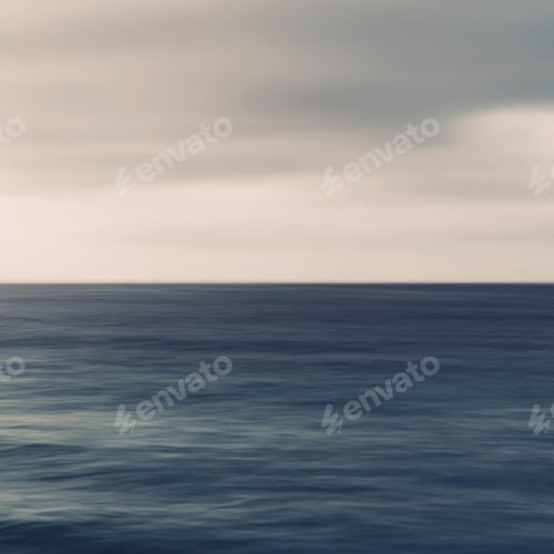 Preview: Turquoise ocean, ripples on the surface and overcast sky.