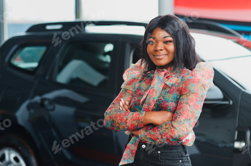 Preview: Women buying the car. Ladies in a car salon. Black girls near white car