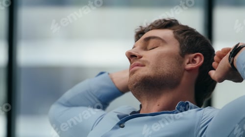 Preview: Satisfied director stretching body office closeup. Comfort at workplace concept