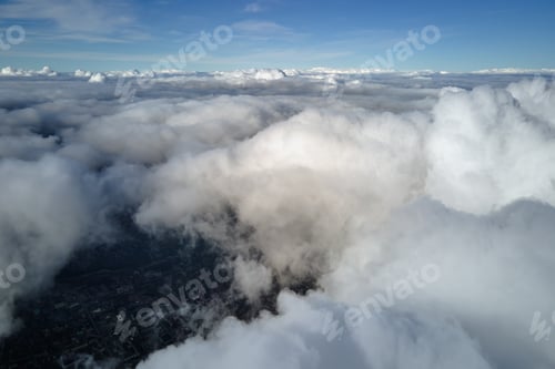 Preview: Aerial view from airplane window at high altitude of earth