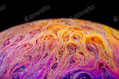Preview: Multicolored abstract chaotic pattern inside of the soap bubble, closeup