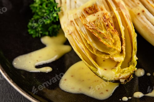 Preview: Chicory roasted or stewed fruit with sauce tasty snack fresh gourmet food background