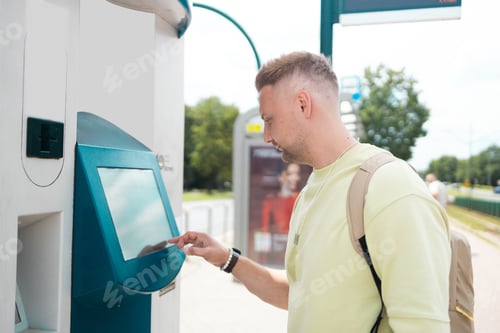 Preview: Caucasian tourist guy buys a bus ticket for the first time using an electronic ticket machine at