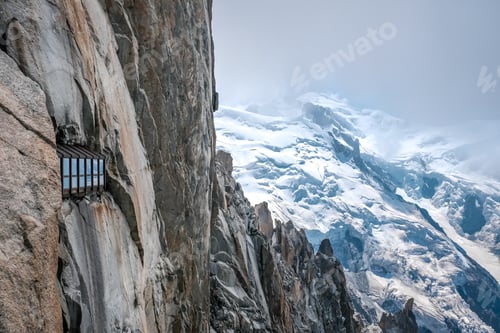 Preview: Windows of the viewpoint of Aiguille du Midi in Montblanc, with views of the snowy mountain.