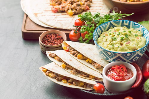 Preview: Quesadillas, Guacamole, and Salsa on a Gray Background