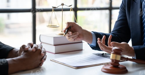 Preview: Law concept. Asian young lawyer or legal advisor explaining details Business contract agreement befo