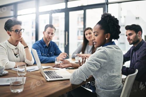 Preview: Sharing ideas and feedback. Cropped shot of a group of businesspeople meeting in the boardroom.