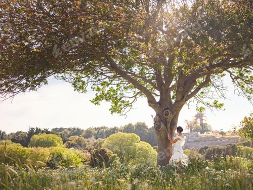 Preview: Beautiful Asian young woman in white dress outdoor